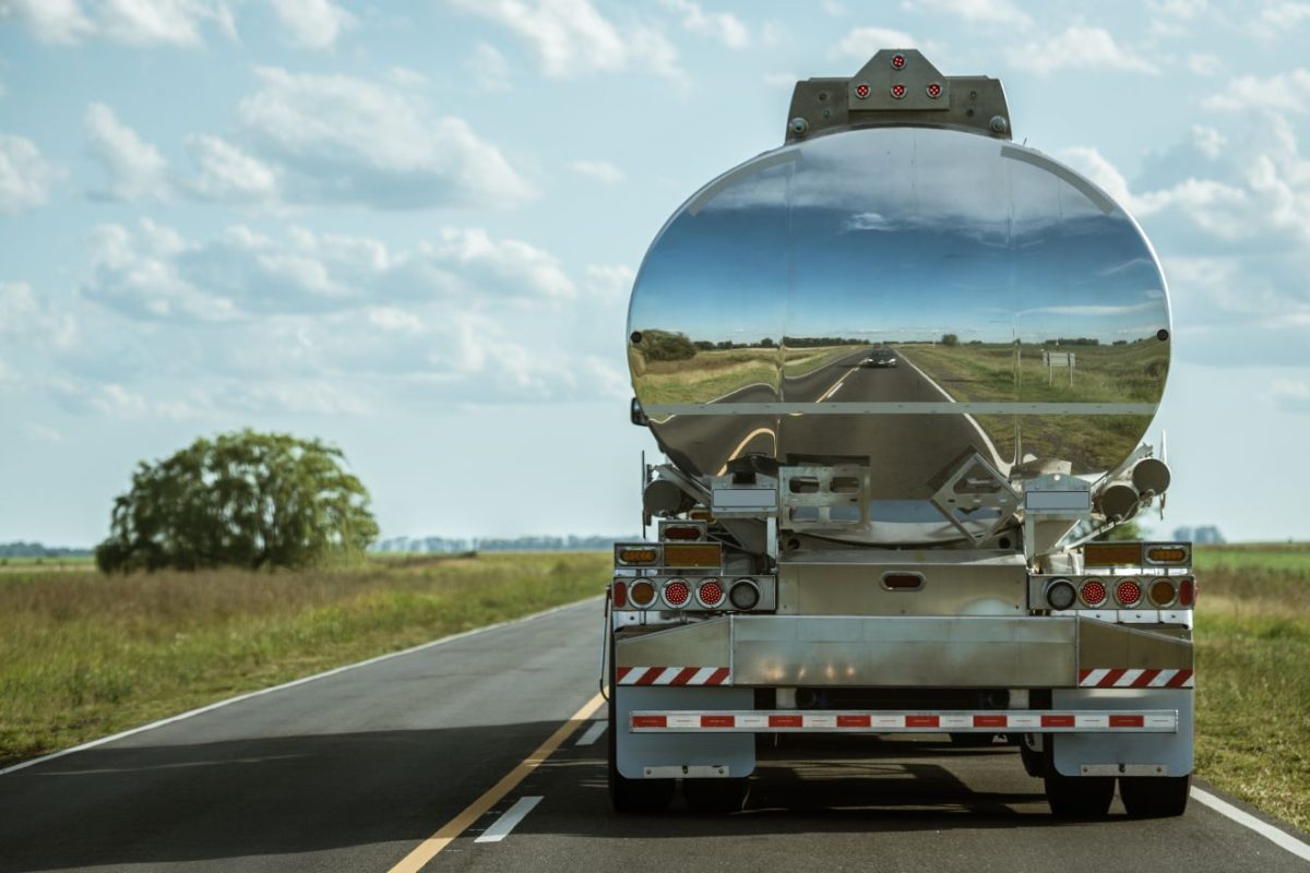 Back-of-an-oil-and-gas-tanker-driving-down-the-road-1200x800